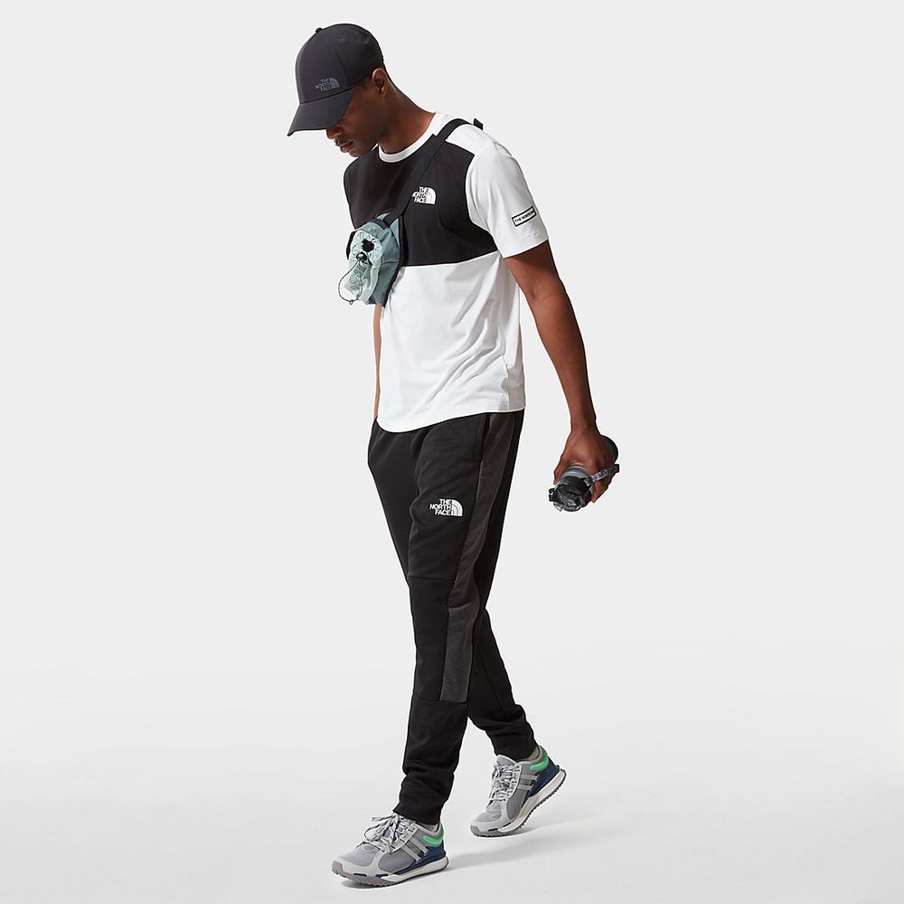 Jogger Nohavice The North Face MOUNTAIN ATHLETICS Panske Čierne | ZJU-324015
